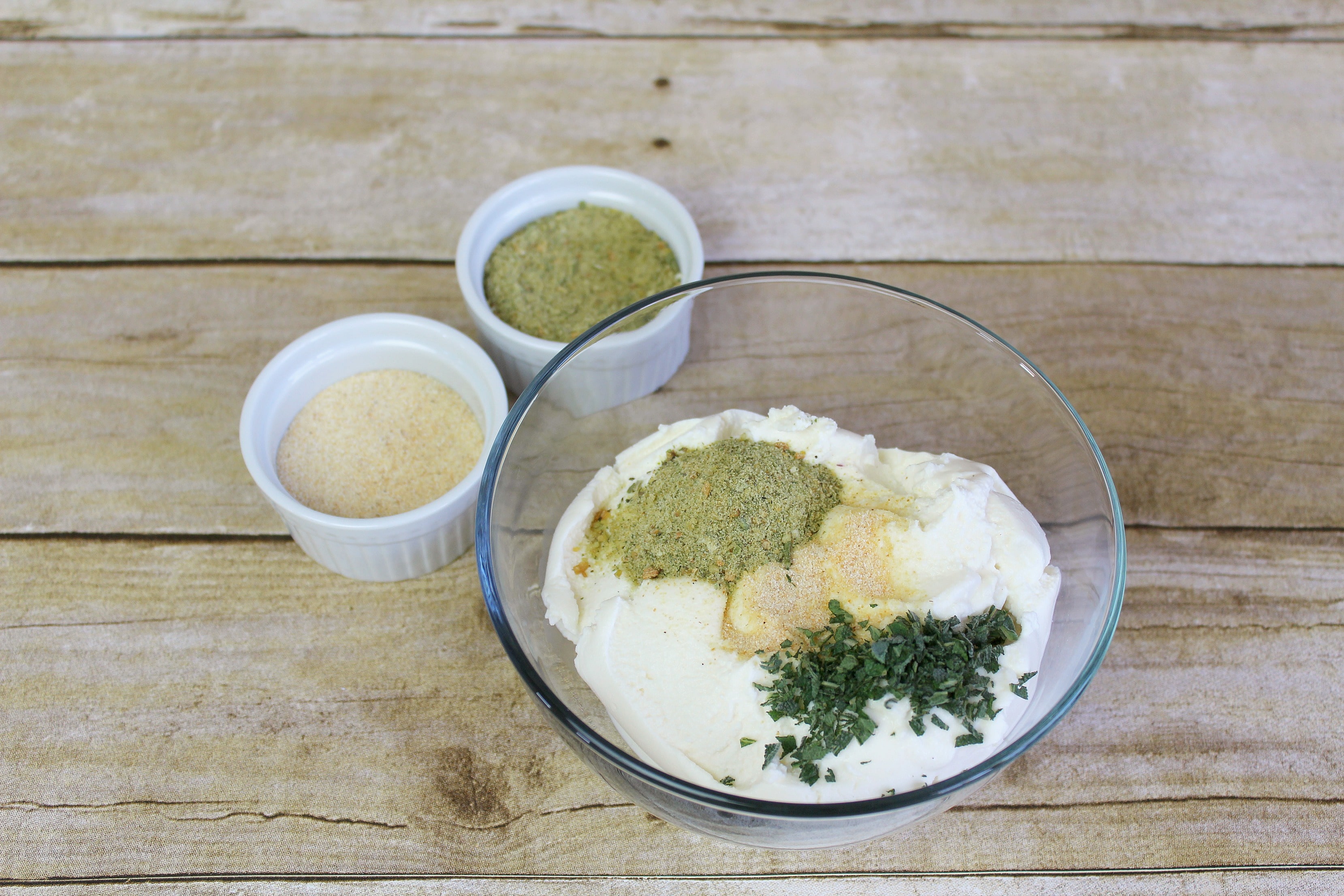 Combine the seasonings and ricotta in a bowl. 