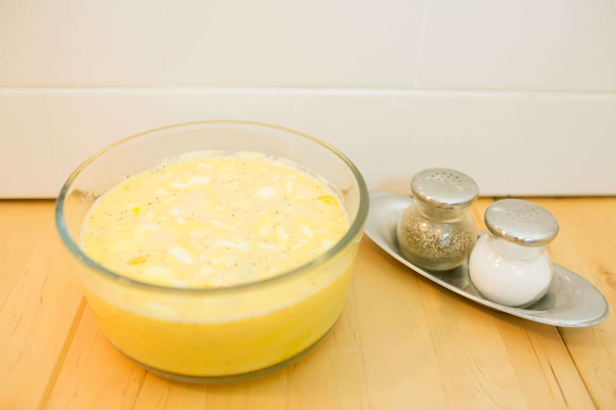 Whisk eggs and cream cheese chunks together then season with salt and pepper