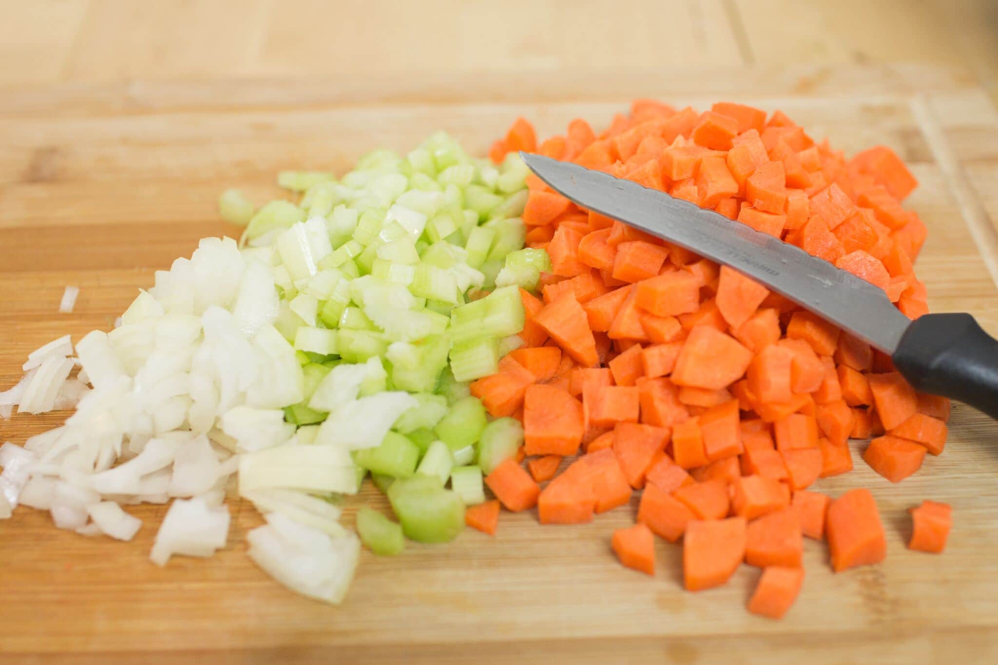 Chop your onions, carrots and celery then set aside.
