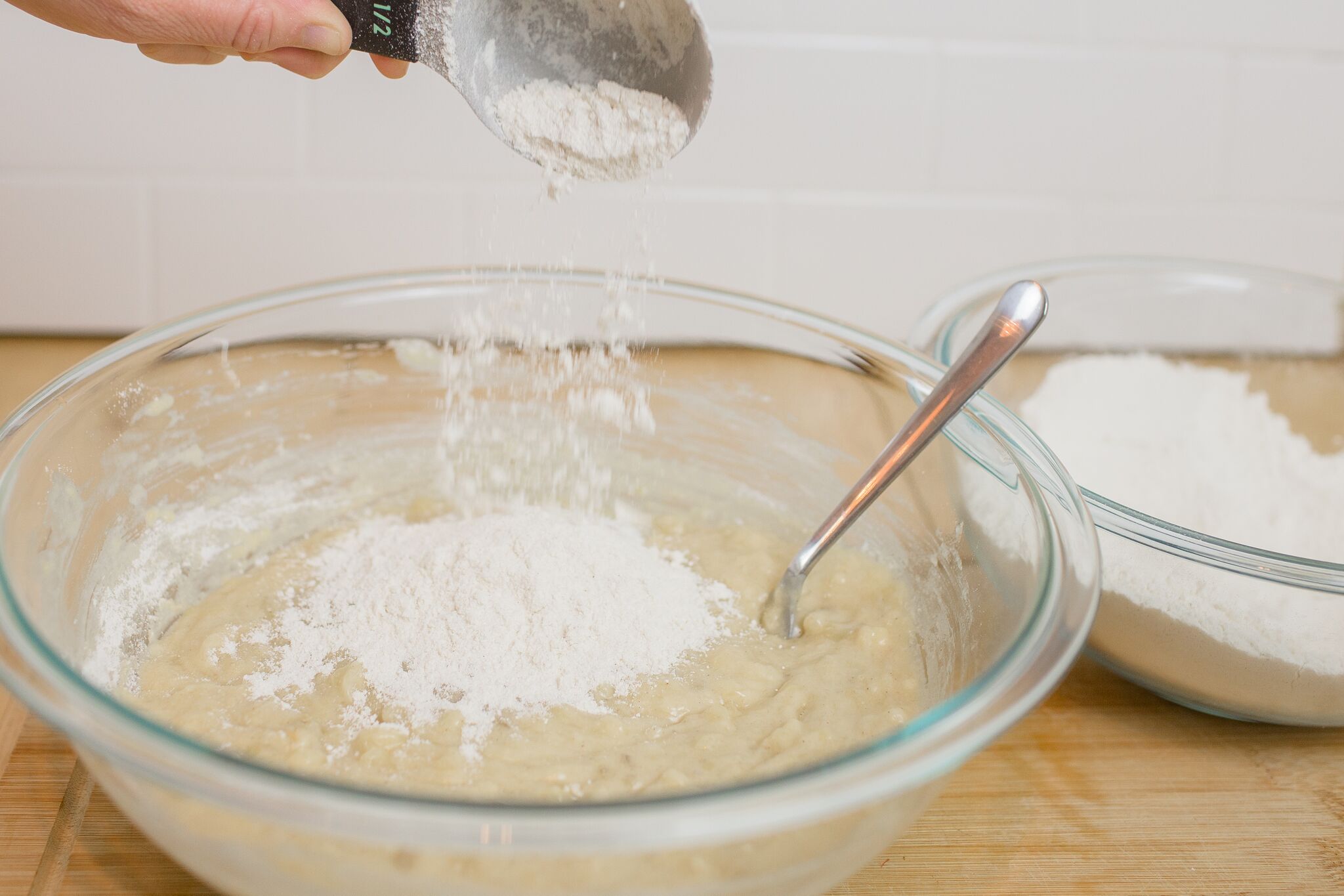 Add dry ingredients into the bowl of wet ingredients. 