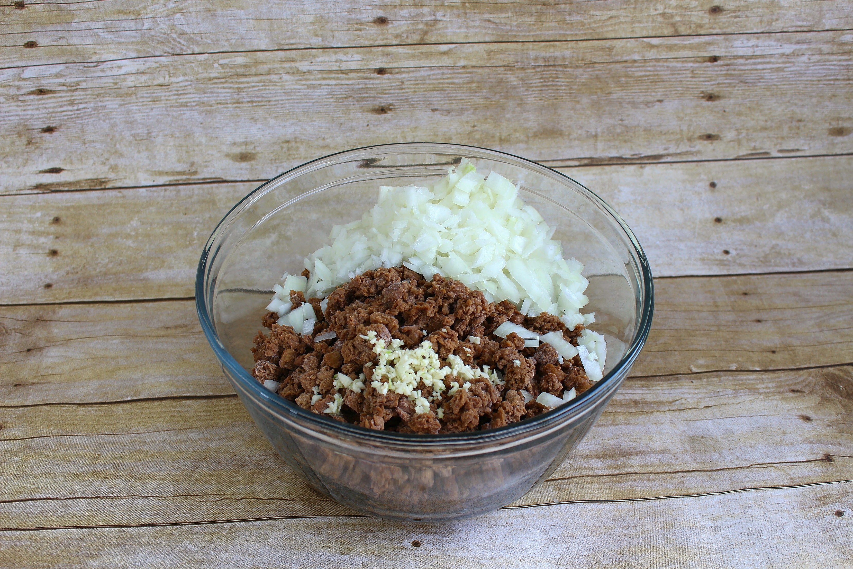 Add onions and garlic to "meat" mixture. 