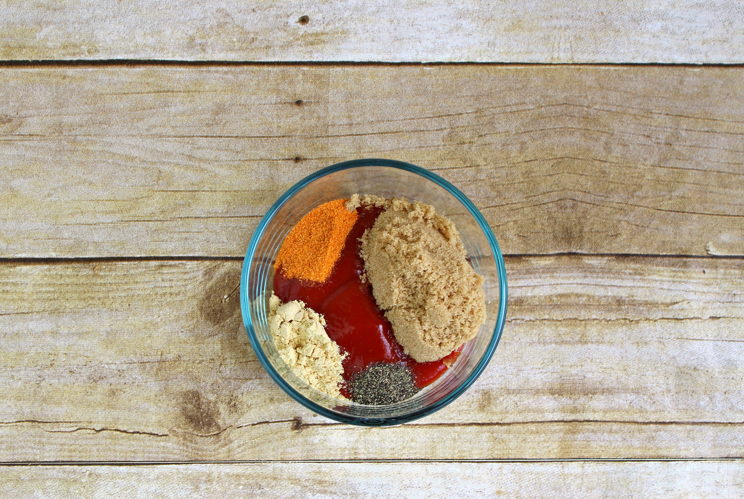 Mix together ingredients for meatloaf topping. 