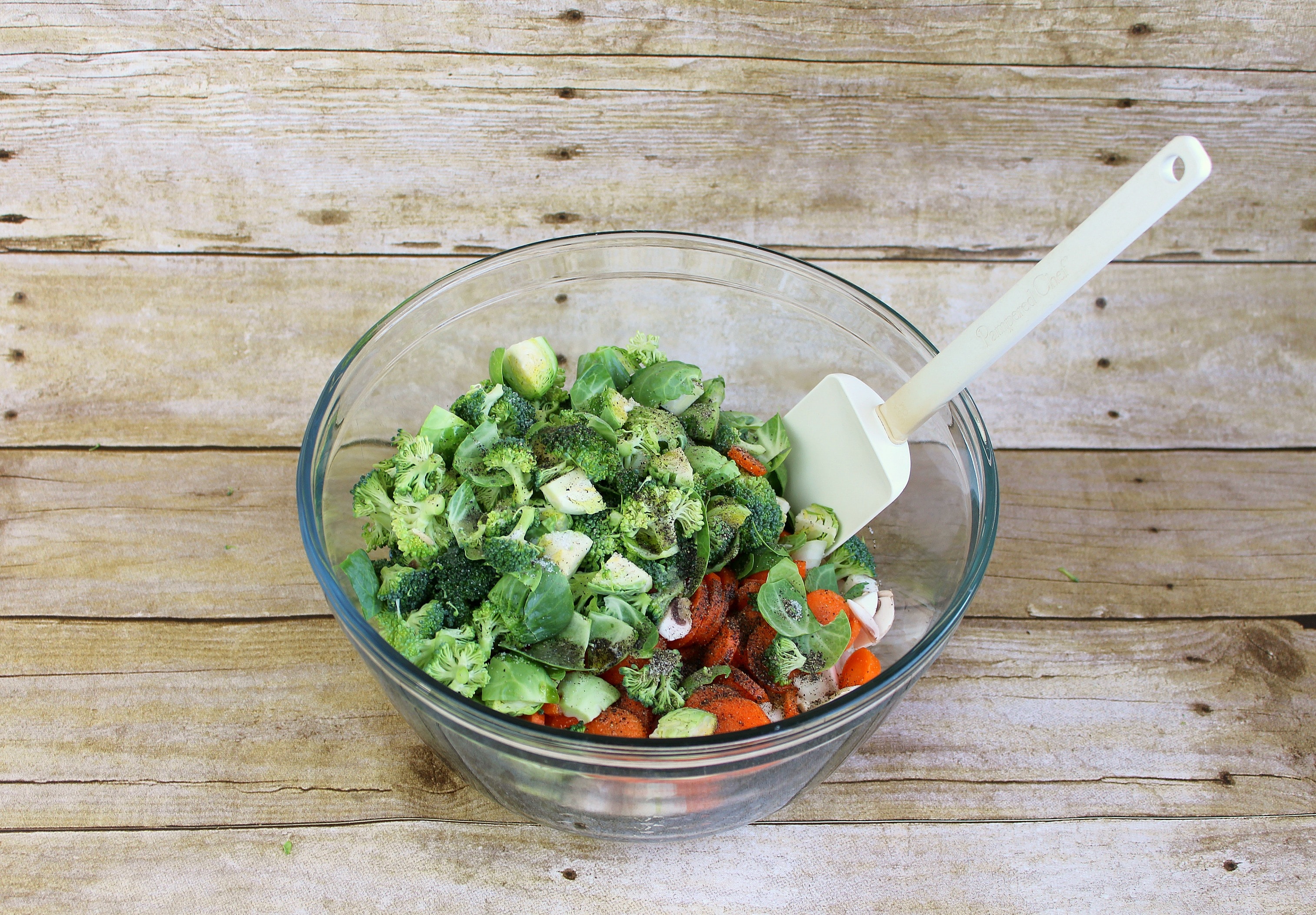 Mix chopped veggies with olive oil