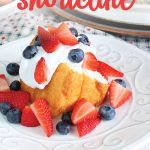This red white and blue- strawberry, blueberry shortcake is the perfect festive 4th of July summer dessert. Perfect for your next Independence Day party! #summerdesserts #4thofjuly #strawberryshortcake