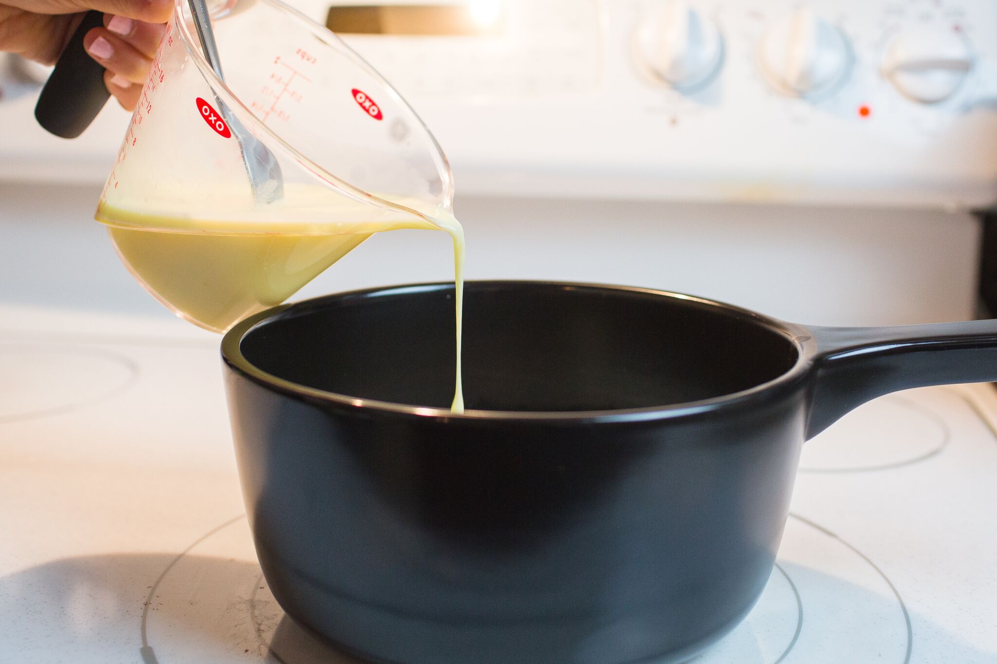 Stir in the lime corn starch slurry into the milk over medium heat