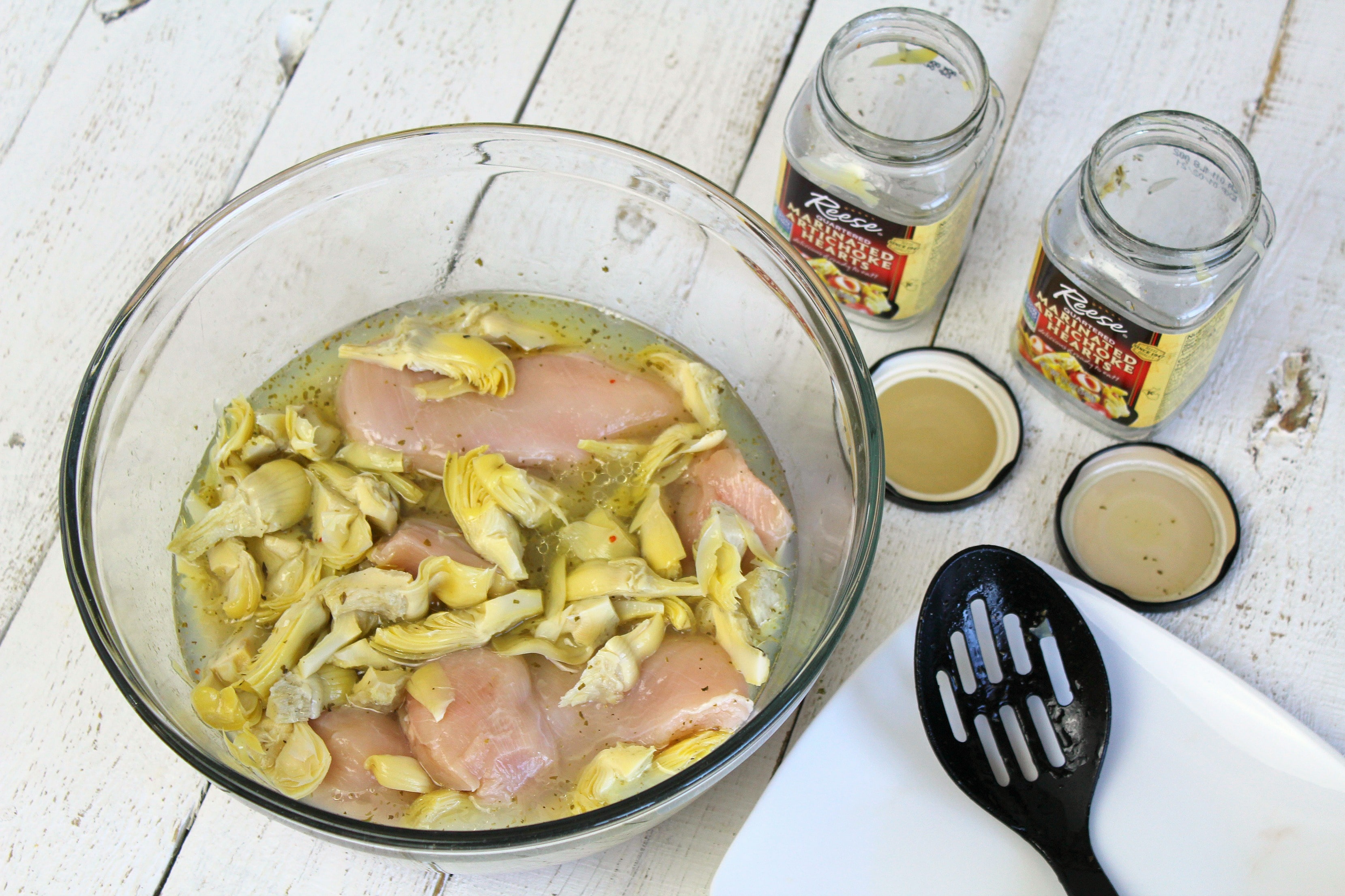 Marinate the chicken breasts with the artichoke hearts for 1-2 hours