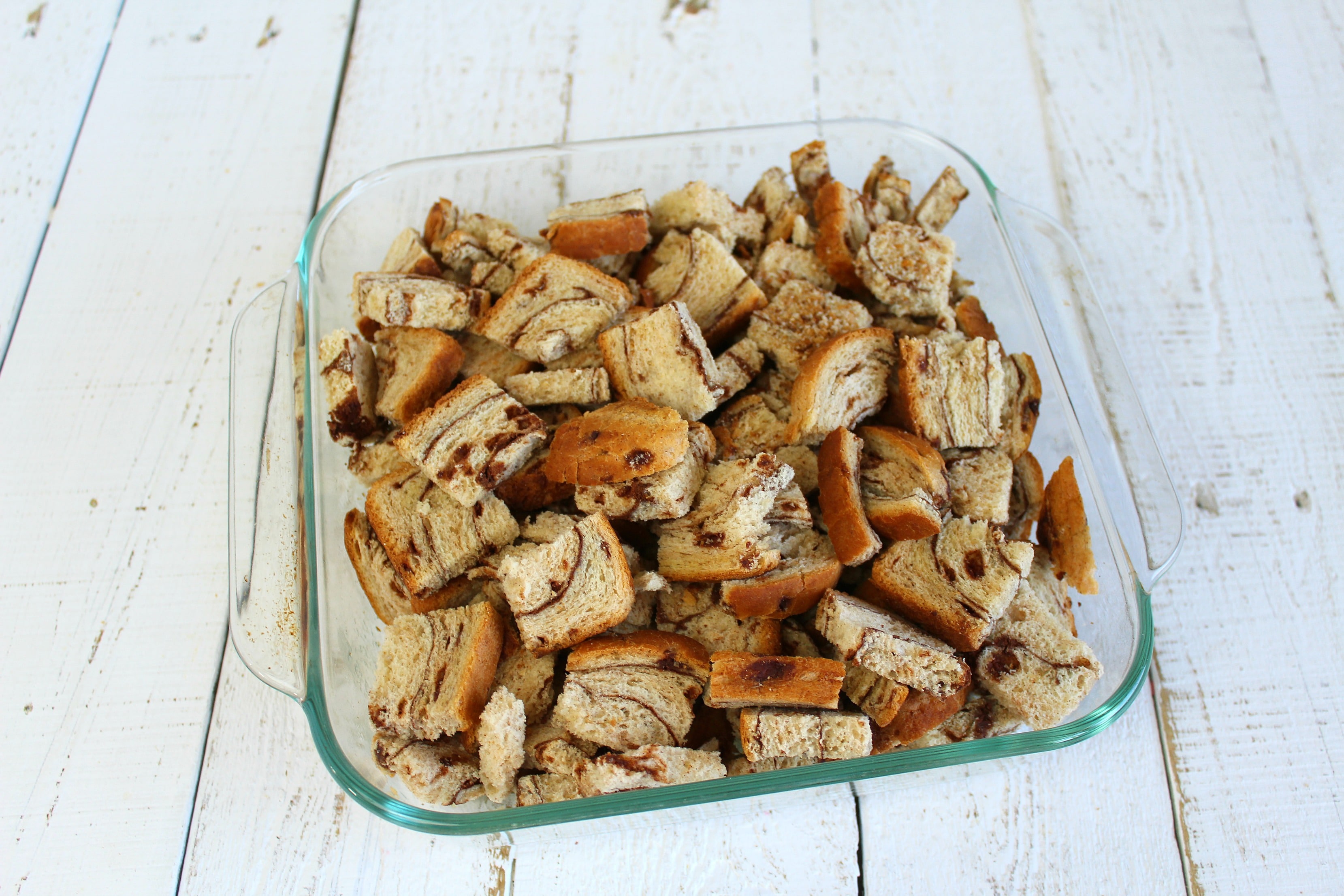 Place cubed bread in pan for best ever bread pudding