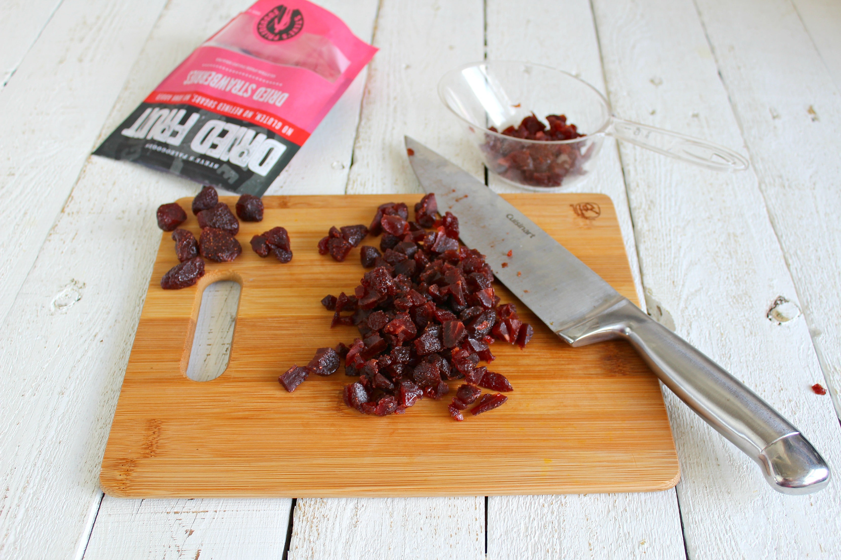 Chop the dried strawberries into bite sized pieces to add to the PB&J bites later