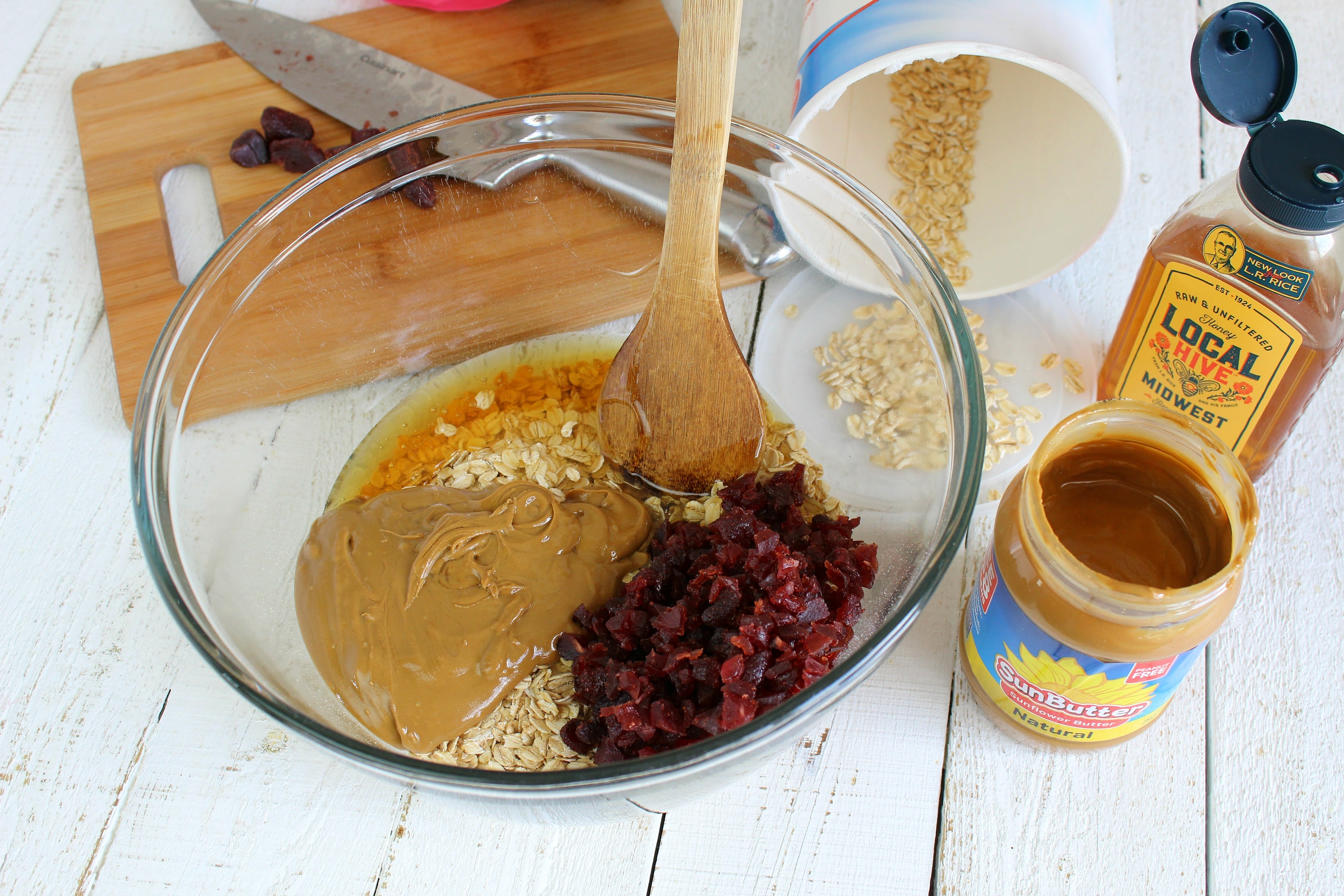 Mix oats, peanut butter, dried strawberries and honey together in a bowl