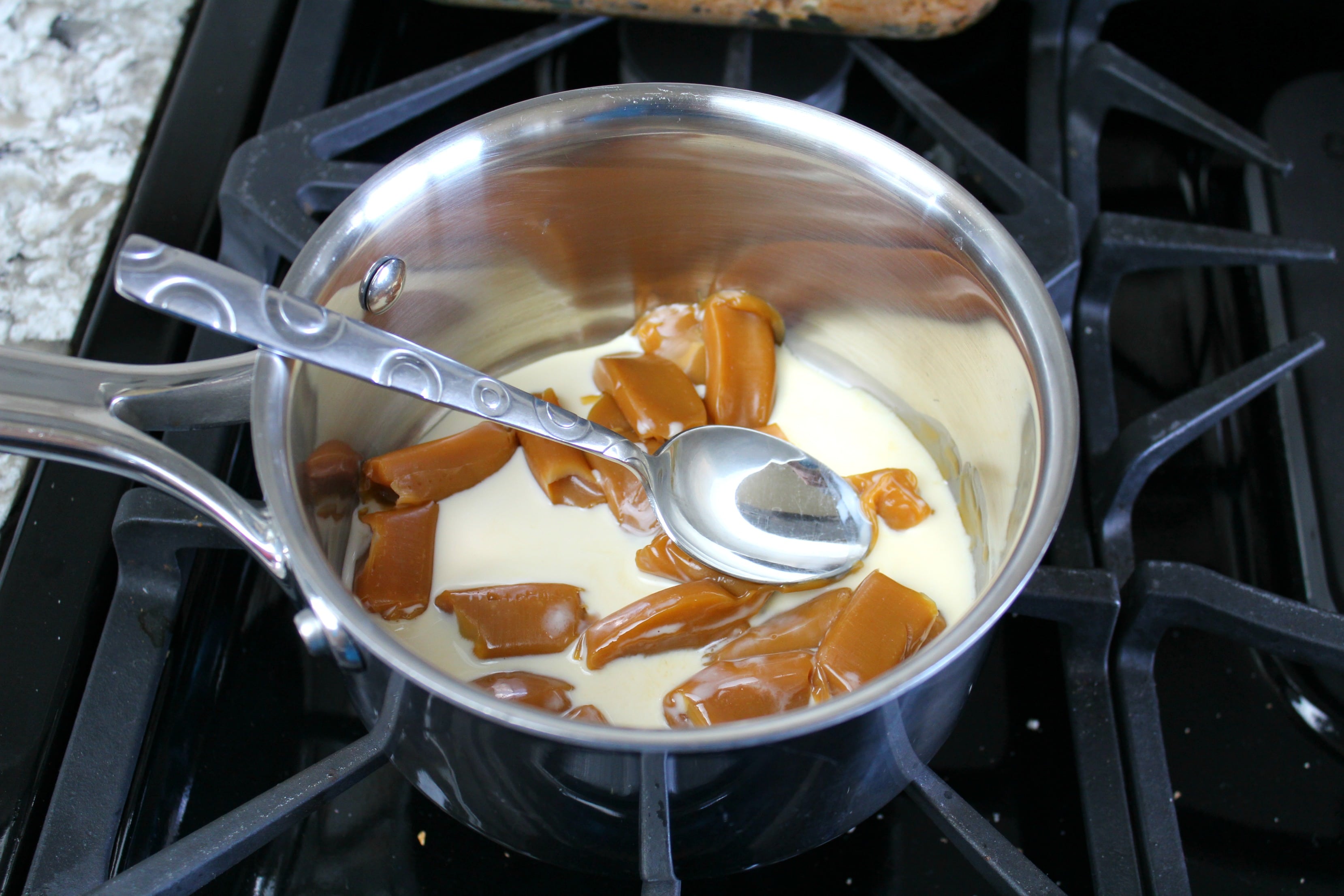 Melt caramels for best ever bread pudding recipe