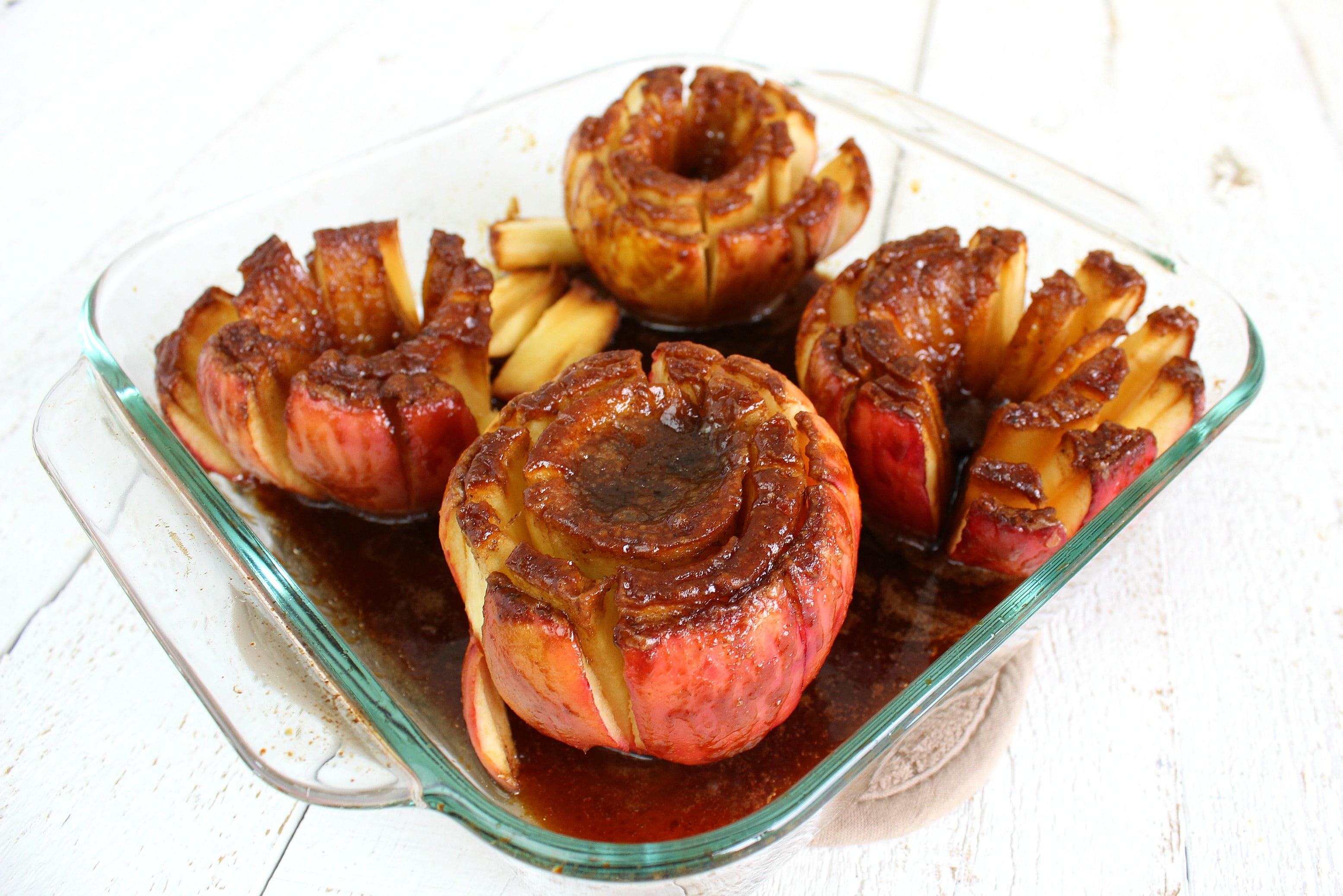 Looking for a last minute dessert recipe to wow your friends? This recipe may be new to you, but I'm sure we're all familiar with blooming onions from a popular restaurant in most of our towns. This Bloomin' Apple recipe is basically the same concept and uses just 5 delicious ingredients and very little effort!