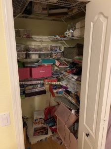 Before of the playroom closet. Ever feel like your mess has gotten to the point of no return? It might be time to get some help with all that decluttering! Don't miss these three surprising lessons from hiring a professional organizer. Decluttering | Organizing | Hiring a Professional Organizer | Marie Kondo