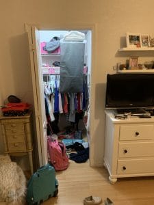 Before Maggie & Annie's closet.Ever feel like your mess has gotten to the point of no return? It might be time to get some help with all that decluttering! Don't miss these three surprising lessons from hiring a professional organizer. Decluttering | Organizing | Hiring a Professional Organizer | Marie Kondo