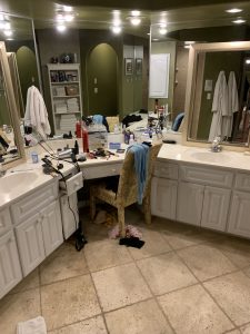 Ruth's bathroom before-Ever feel like your mess has gotten to the point of no return? It might be time to get some help with all that decluttering! Don't miss these three surprising lessons from hiring a professional organizer. Decluttering | Organizing | Hiring a Professional Organizer | Marie Kondo