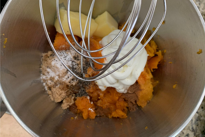 Step 3- blend all ingredients until fluffy. A word of warning--once you've tried these incredible Twice Baked Sweet Potatoes, no other sweet potatoes will ever quite compare! They're not only utterly delicious (not to mention semi-addicting) and also a complete show-stopper for your Thanksgiving dinner. #recipes #thanksgivingrecipes #holidayrecipes #easyrecipes 