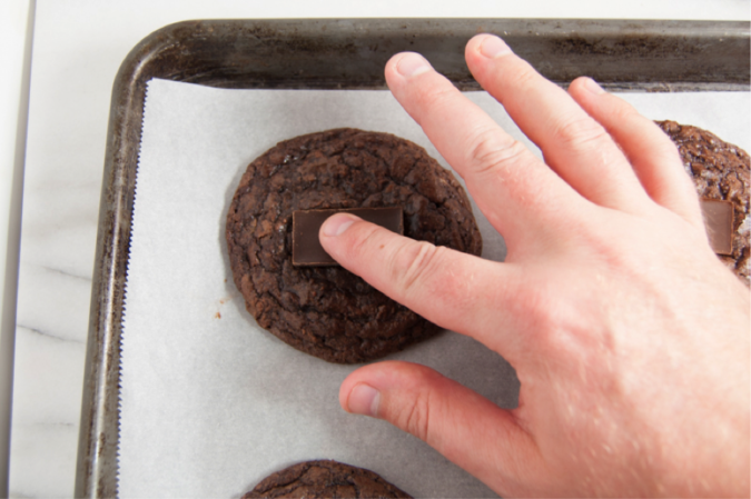 Bake for 10 -12 minutes then press one mint into each cookie